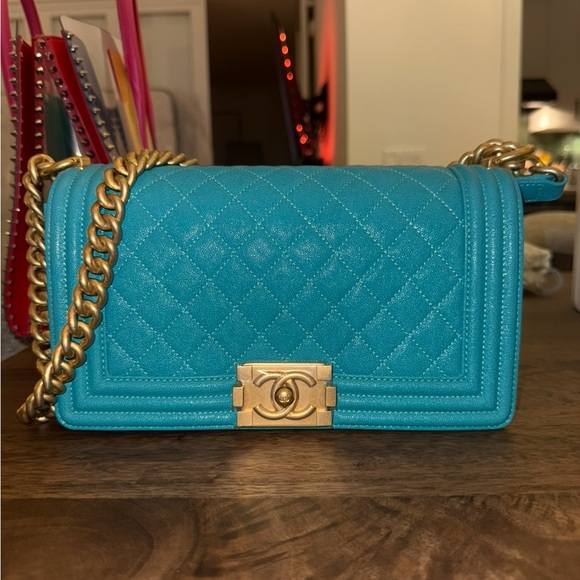 CHANEL Handbags - CHANEL Blue Quilted boy bag with Gold Chain